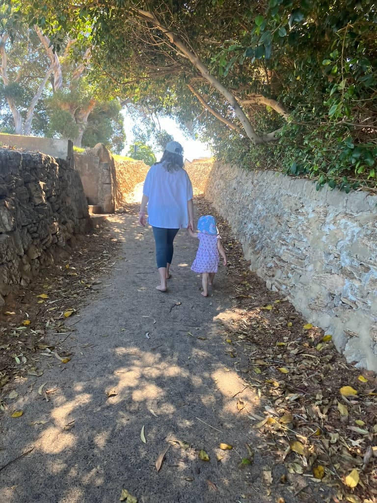 Mum and child walking together